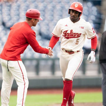 Indiana outfielder Devin Taylor rounds the bases after he hit a two-run home run at Charles Schwab Field in Omaha, Neb. in Indiana's 5-2 loss to Rutgers on May 20, 2025.