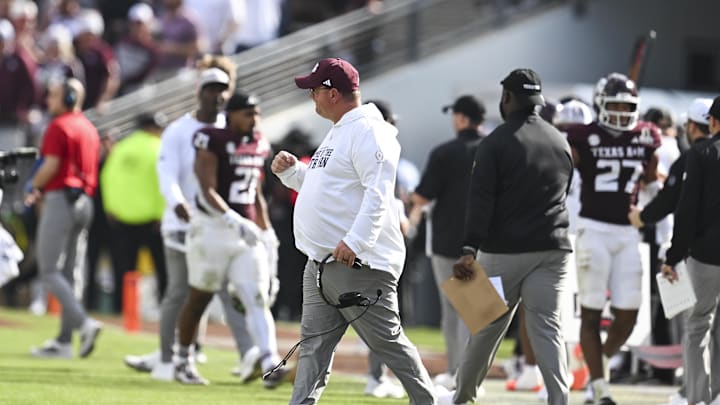Dec 20, 2025; College Station, TX, USA; Texas A&M Aggies head coach Mike Elko reacts during the second half of the first round game of the CFP National Playoff against the Miami Hurricanes at Kyle Field. Mandatory Credit: Maria Lysaker-Imagn Images
