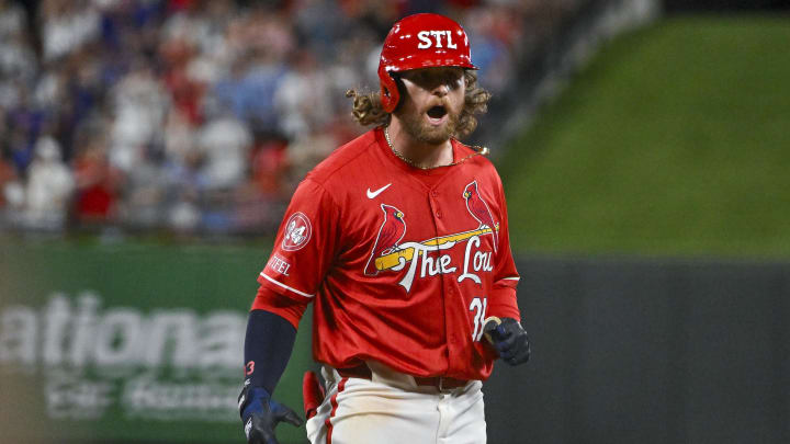 May 25, 2024; St. Louis, Missouri, USA;  St. Louis Cardinals left fielder Brendan Donovan (33) reacts after hitting a two run single against the Chicago Cubs during the eighth inning at Busch Stadium.