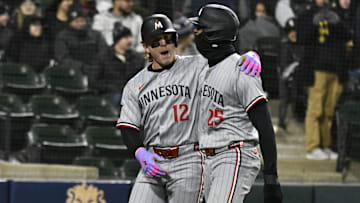 Apr 1, 2025; Chicago, Illinois, USA;  Minnesota Twins outfielder Harrison Bader (12) celebrates with Minnesota Twins outfielder Byron Buxton (25) after they scored on Bader’s  three run home against the Chicago White Sox during the eighth inning at Guaranteed Rate Field.