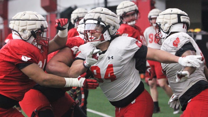 Wisconsin defensive lineman Elijah Hills (94) battles with an offensive lineman during the team's 14th spring practice, which was held Tuesday morning April 30, 2024 at the McClain Center in Madison, Wisconsin.