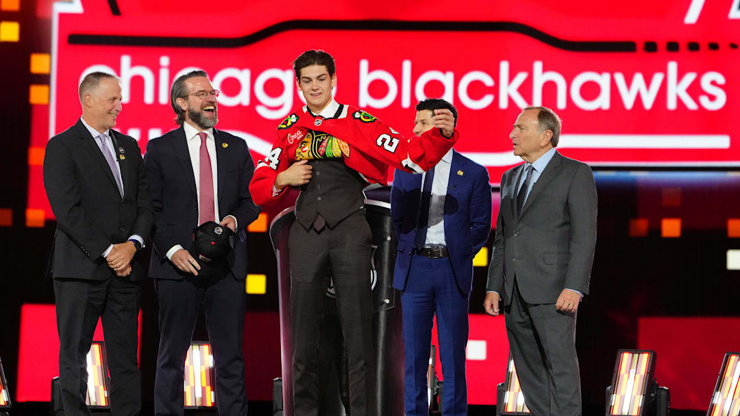 Jun 28, 2024; Las Vegas, Nevada, USA; Sacha Boisvert is selected by the Chicago Blackhawks with the 18th overall pick in the first round of the 2024 NHL Draft at The Sphere. Mandatory Credit: Stephen R. Sylvanie-Imagn Images