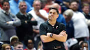 Cincinnati Bearcats head coach Wes Miller looks up at the score in the second half of the 91st Crosstown Shootout basketball game between the Cincinnati Bearcats and the Xavier Musketeers, Saturday, Dec. 9, 2023, at Cintas Center in Cincinnati. The Xavier Musketeers won, 84-79.