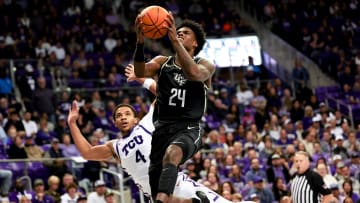 Mar 9, 2024; Fort Worth, Texas, USA;  UCF Knights guard Jaylin Sellers (24) shoots past TCU Horned Frogs guard Jameer Nelson Jr. (4) during the second half at Ed and Rae Schollmaier Arena. Mandatory Credit: Kevin Jairaj-USA TODAY Sports
