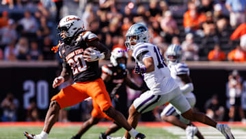 Nov 15, 2025; Stillwater, Oklahoma, USA; Oklahoma State Cowboys running back Rodney Fields Jr. (20) runs the ball during the first half against the Kansas State Wildcats at Boone Pickens Stadium. Mandatory Credit: William Purnell-Imagn Images