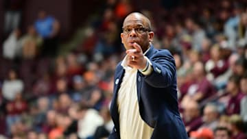 Mar 4, 2025; Blacksburg, Virginia, USA;  North Carolina Tar Heels head coach Hubert Davis points at a player during the second half against Virginia Tech Hokies at Cassell Coliseum. Mandatory Credit: Brian Bishop-Imagn Images