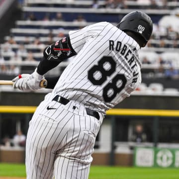 Jun 7, 2024; Chicago, Illinois, USA;  Chicago White Sox outfielder Luis Robert Jr. (88) hits a home run against the Boston Red Sox during the first inning at Guaranteed Rate Field