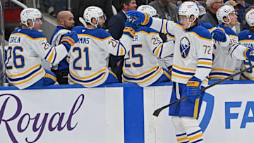 Oct 25, 2025; Toronto, Ontario, CAN; Buffalo Sabres center Tage Thompson (72) shakes hands with his teammates on the bench after a Sabres goal against the Toronto Maple Leafs in the first period  at Scotiabank Arena. Mandatory Credit: Gerry Angus-Imagn Images