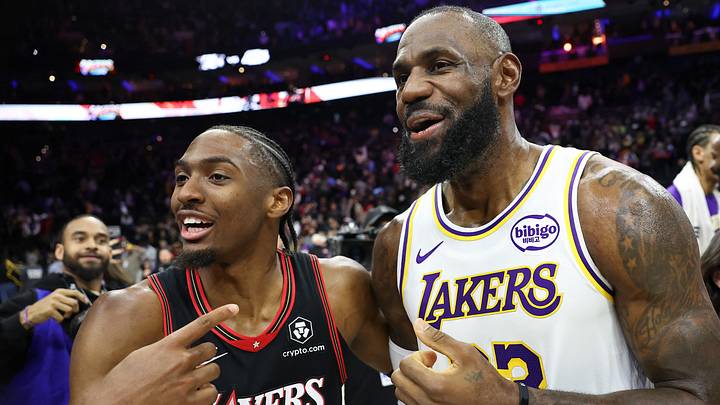 Dec 7, 2025; Philadelphia, Pennsylvania, USA; Los Angeles Lakers forward Lebron James (23) and Philadelphia 76ers guard Tyrese Maxey react with each other after the game at Xfinity Mobile Arena. Mandatory Credit: Bill Streicher-Imagn Images