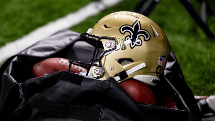 Nov 5, 2023; New Orleans, Louisiana, USA;  Detailed view of the New Orleans Saints helmet and ball bag against the Chicago Bears during the first half at the Caesars Superdome. Mandatory Credit: Stephen Lew-USA TODAY Sports