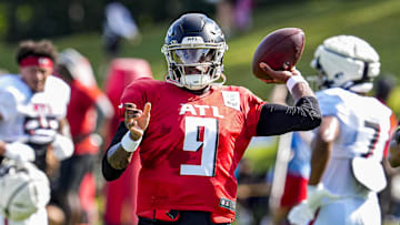 Atlanta Falcons quarterback Michael Penix Jr. (9) passes the ball during practice at NFL training camp