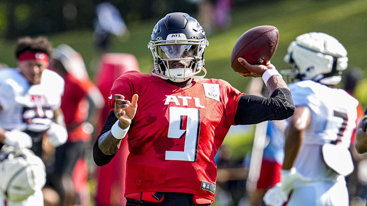 Atlanta Falcons quarterback Michael Penix Jr. (9) passes the ball during practice at NFL training camp