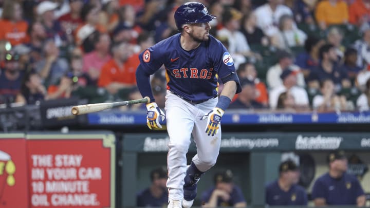 May 19, 2024; Houston, Texas, USA; Houston Astros third baseman Alex Bregman (2) hits a double during the third inning against the Milwaukee Brewers at Minute Maid Park.