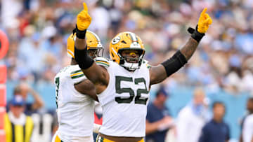 Sep 22, 2024; Nashville, Tennessee, USA;  Green Bay Packers defensive end Rashan Gary (52) celebrates the sack against the Tennessee Titans during the second half at Nissan Stadium. Mandatory Credit: Steve Roberts-Imagn Images
