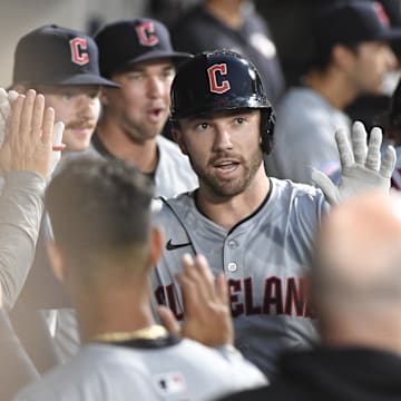 Sep 9, 2024; Chicago, Illinois, USA;  Cleveland Guardians catcher David Fry (6) celebrates in the dugout after his home run during the third inning at Guaranteed Rate Field. Mandatory Credit: Matt Marton-Imagn Images