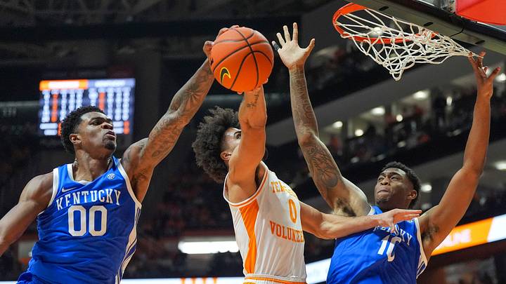 Kentucky guard Otega Oweh (00) and Kentucky forward Brandon Garrison (10) block the basket from Tennessee guard Ja'Kobi Gillespie (0) during a NCAA basketball game between the Tennessee Volunteers and Kentucky Wildcats at Thompson-Boling Arena at Food City Center in Knoxville, Tenn., on Jan. 17, 2026.