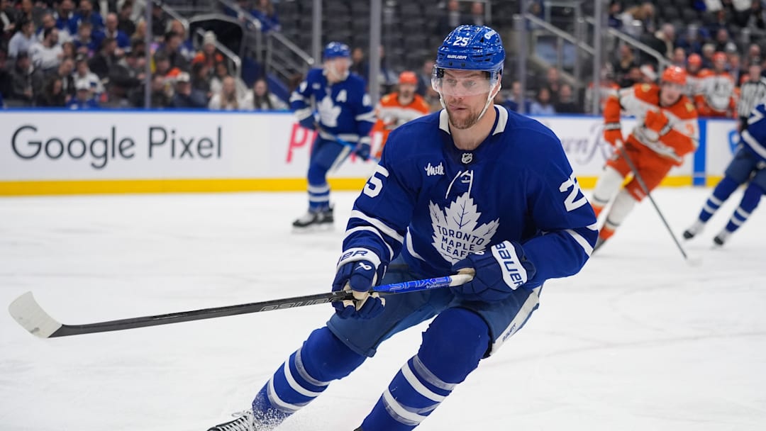 Mar 12, 2026; Toronto, Ontario, CAN; Toronto Maple Leafs defenseman Brandon Carlo (25) skates against the Anaheim Ducks at Scotiabank Arena. Mandatory Credit: John E. Sokolowski-Imagn Images