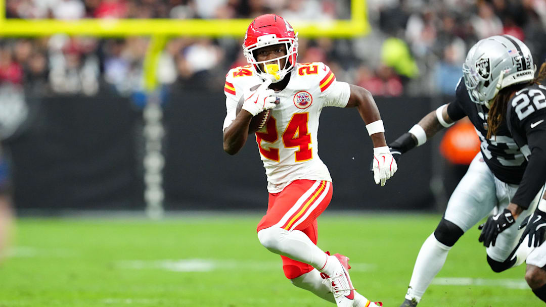 Jan 4, 2026; Paradise, Nevada, USA; Kansas City Chiefs running back Brashard Smith (24) gains yardage against the Las Vegas Raiders during the first quarter at Allegiant Stadium. Mandatory Credit: Stephen R. Sylvanie-Imagn Images