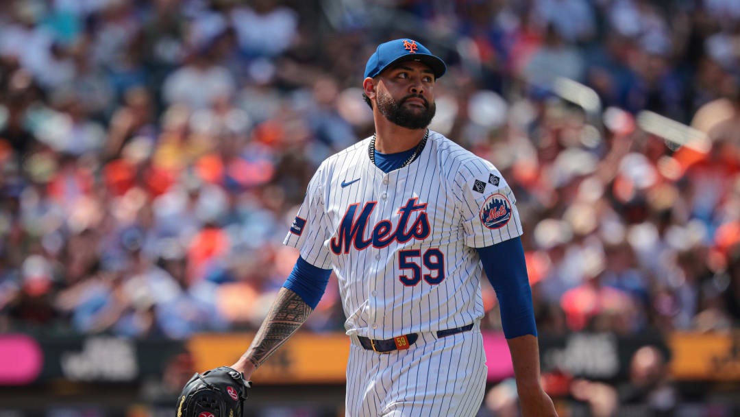 Aug 21, 2024; New York City, New York, USA; New York Mets starting pitcher Sean Manaea (59) reacts after walking off the field after the top of the sixth inning  against the Baltimore Orioles at Citi Field. Mandatory Credit: Vincent Carchietta-USA TODAY Sports