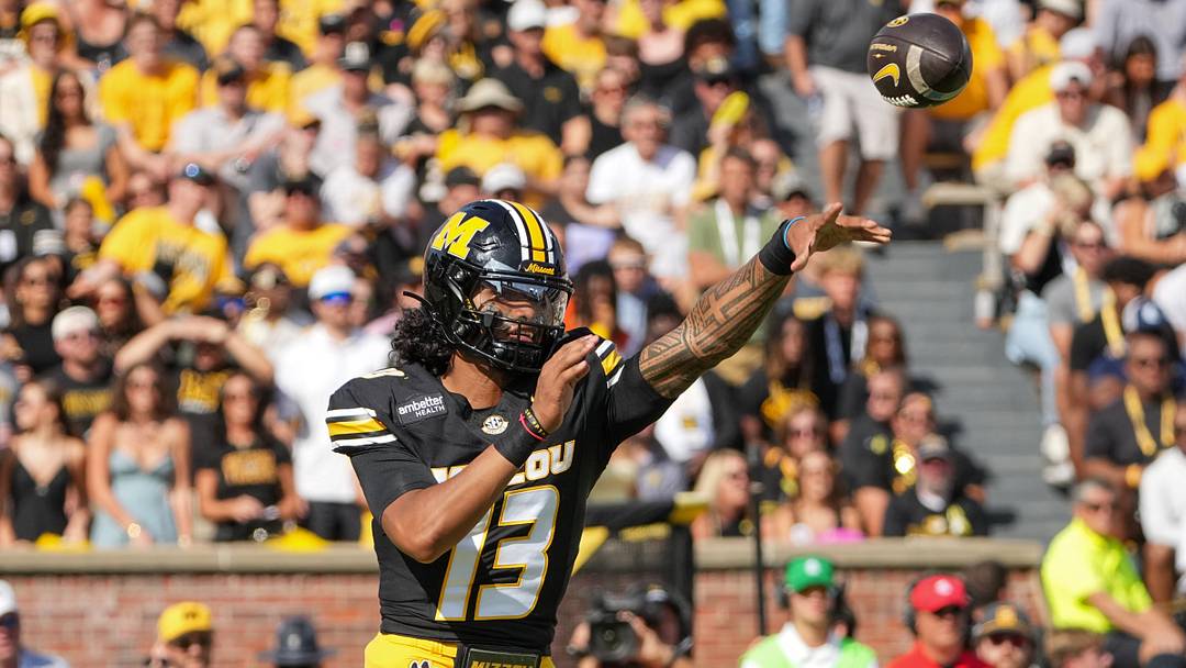 Oct 10, 2026; Columbia, Missouri, USA; Missouri Tigers quarterback Austin Simmons (13) throws a pass against the Texas A&M Aggies during the first half of the game at Faurot Field at Memorial Stadium. Mandatory Credit: Denny Medley-Imagn Images Oct 10, 2026; Columbia, Missouri, USA; Missouri Tigers quarterback Austin Simmons (13) throws a pass against the Texas A&M Aggies during the first half of the game at Faurot Field at Memorial Stadium. Mandatory Credit: Denny Medley-Imagn Images