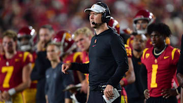 Oct 7, 2023; Los Angeles, California, USA; Southern California Trojans head coach Lincoln Riley watches game action against the Arizona Wildcats during the second half at Los Angeles Memorial Coliseum. Mandatory Credit: Gary A. Vasquez-Imagn Images