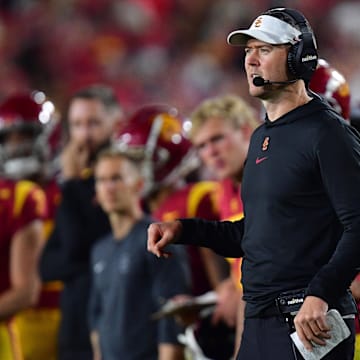 Oct 7, 2023; Los Angeles, California, USA; Southern California Trojans head coach Lincoln Riley watches game action against the Arizona Wildcats during the second half at Los Angeles Memorial Coliseum. Mandatory Credit: Gary A. Vasquez-Imagn Images