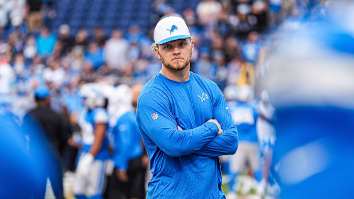 Detroit Lions defensive end Aidan Hutchinson (97) watches warm up ahead of the Hall of Fame Game at Tom Benson Hall of Fame Stadium in Canton, Ohio on Thursday, July 31, 2025.