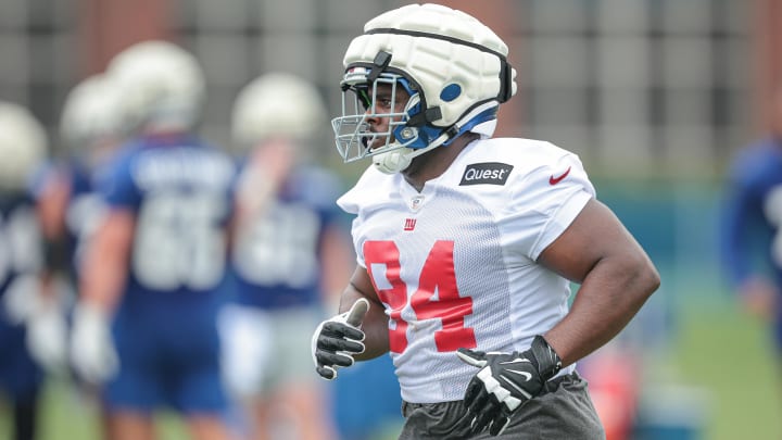 Jul 24, 2024; East Rutherford, NJ, USA; New York Giants defensive tackle Elijah Chatman (94) runs on the field during training camp at Quest Diagnostics Training Facility. Mandatory Credit: Vincent Carchietta-USA TODAY Sports