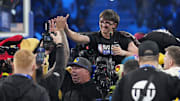 Feb 16, 2025; San Francisco, CA, USA; A fan celebrates after participating in a competition against Shaq’s OGs guard Damian Lillard (0) of the Milwaukee Bucks to win $100,000 during the 2025 NBA All Star Game at Chase Center. Mandatory Credit: Kyle Terada-Imagn Images
