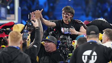 Feb 16, 2025; San Francisco, CA, USA; A fan celebrates after participating in a competition against Shaq’s OGs guard Damian Lillard (0) of the Milwaukee Bucks to win $100,000 during the 2025 NBA All Star Game at Chase Center. Mandatory Credit: Kyle Terada-Imagn Images