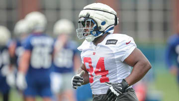 Jul 24, 2024; East Rutherford, NJ, USA; New York Giants defensive tackle Elijah Chatman (94) runs on the field during training camp at Quest Diagnostics Training Facility. Mandatory Credit: Vincent Carchietta-USA TODAY Sports