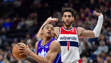 Mar 19, 2025; Salt Lake City, Utah, USA;  Utah Jazz guard Keyonte George (3) makes move around Washington Wizards guard Colby Jones (1) during the second half at the Delta Center. Mandatory Credit: Peter Creveling-Imagn Images