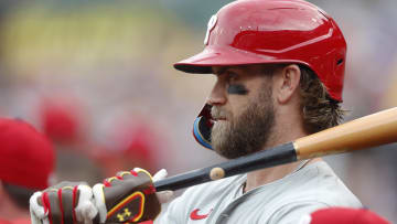 Jul 20, 2024; Pittsburgh, Pennsylvania, USA;  Philadelphia Phillies first baseman Bryce Harper (3) waits to bat in the dugout against the Pittsburgh Pirates during the first inning at PNC Park. Mandatory Credit: Charles LeClaire-USA TODAY Sports