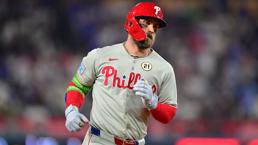Sep 15, 2025; Los Angeles, California, USA; Philadelphia Phillies first baseman Bryce Harper (3) runs the bases after hitting a solo home run against the Los Angeles Dodgers during the eighth inning at Dodger Stadium. Mandatory Credit: Gary A. Vasquez-Imagn Images