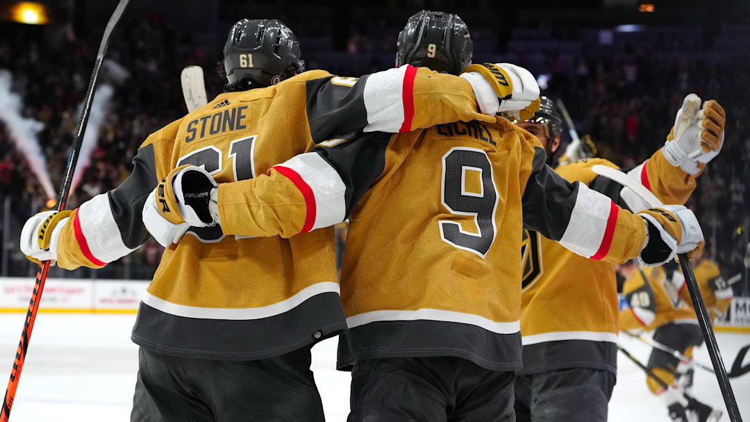 Dec 12, 2023; Las Vegas, Nevada, USA; Vegas Golden Knights right wing Mark Stone (61) celebrates with Vegas Golden Knights center Jack Eichel (9) after scoring a goal against the Calgary Flames in an overtime period to give the Golden Knights a 5-4 victory at T-Mobile Arena. Mandatory Credit: Stephen R. Sylvanie-Imagn Images