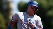 Texas Rangers third baseman Josh Jung (6) runs the bases after hitting a solo home run against the Athletics during the second inning at Sutter Health Park. 