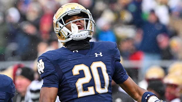 Notre Dame Fighting Irish cornerback Benjamin Morrison celebrates after an interception in the first quarter 