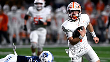 Celina quarterback Bowe Bentley scrambles with the ball during the Bobcats’ Class 4A Div. I semi-final game against West Plains in Abilene Dec. 13, 2024. Final score was 43-36, Celina.