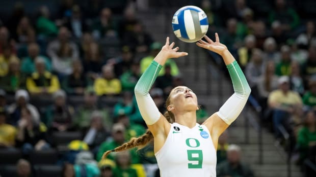 Oregon setter Hannah Pukis sets the ball as the No. 2 Oregon Ducks open NCAA Tournament play against Southeastern Louisiana