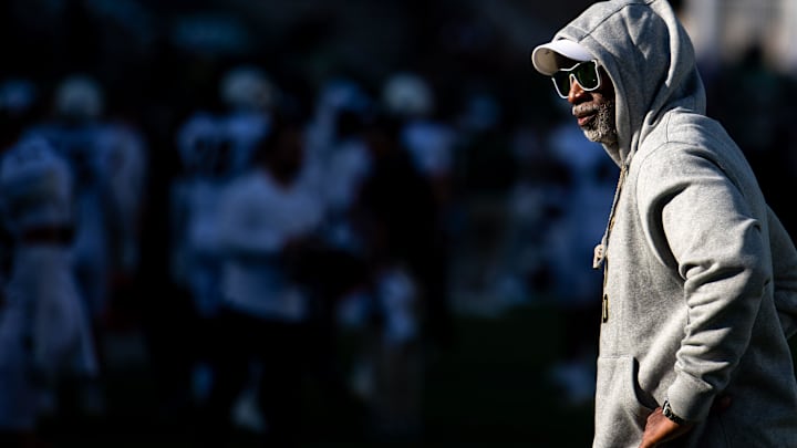 CU football head coach Deion Sanders, or Coach Prime, watches his team warm up before the game against CSU in the Rocky Mountain Showdown at Canvas Stadium on Saturday, Sept. 14, 2024, in Fort Collins, Colo.