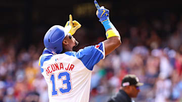 Atlanta Braves outfielder Ronald Acuna Jr. (13) celebrates hitting a home run against the Colorado Rockies during the second inning at Truist Park.