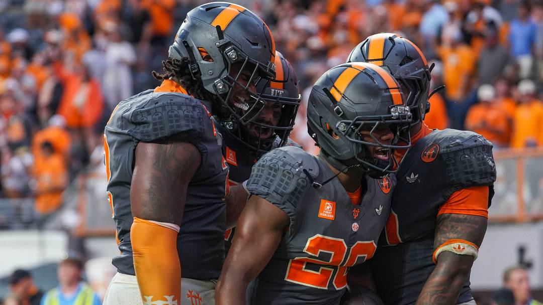 Tennessee defensive back Tevis Metcalf (20) celebrates with teammates after catching an interception during a college football game between Tennessee and Auburn at Neyland Stadium in Knoxville, Tenn., on Oct. 3, 2026. Tennessee defensive back Tevis Metcalf (20) celebrates with teammates after catching an interception during a college football game between Tennessee and Auburn at Neyland Stadium in Knoxville, Tenn., on Oct. 3, 2026.