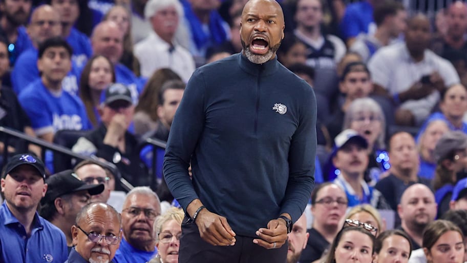 Orlando Magic head coach Jamahl Mosley during the first quarter against the Charlotte Hornets .