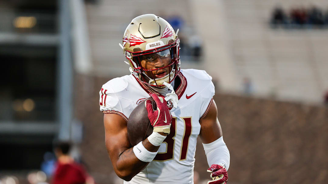 Oct 18, 2024; Durham, North Carolina, USA;  Florida State Seminoles linebacker DeMarco Ward (31) runs with the football prior to the first half of the game against Duke Blue Devils at Wallace Wade Stadium. Mandatory Credit: Jaylynn Nash-Imagn Images