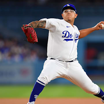 September 1, 2023; Los Angeles, California, USA; Los Angeles Dodgers starting pitcher Julio Urias (7) throws against the Atlanta Braves during the first inning at Dodger Stadium. Mandatory Credit: Gary A. Vasquez-Imagn Images