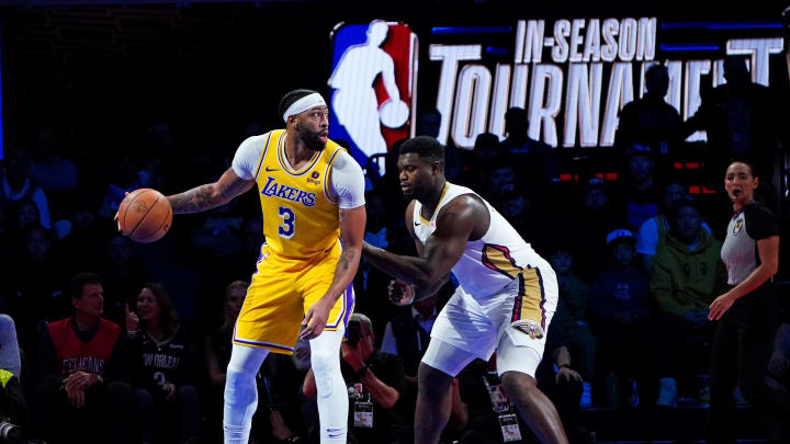 Dec 7, 2023; Las Vegas, Nevada, USA; Los Angeles Lakers forward Anthony Davis (3) handles the ball against New Orleans Pelicans forward Zion Williamson (1) during the second quarter in the NBA In Season Tournament Semifinal at T-Mobile Arena. 