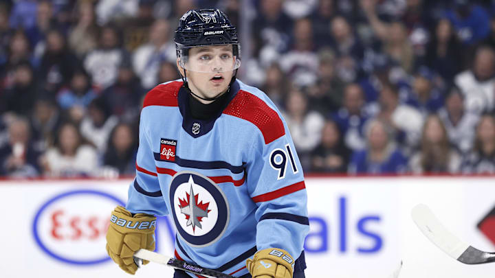 Jan 27, 2024; Winnipeg, Manitoba, CAN; Winnipeg Jets center Cole Perfetti (91) looks on in the second period against the Toronto Maple Leafs at Canada Life Centre. Mandatory Credit: James Carey Lauder-Imagn Images