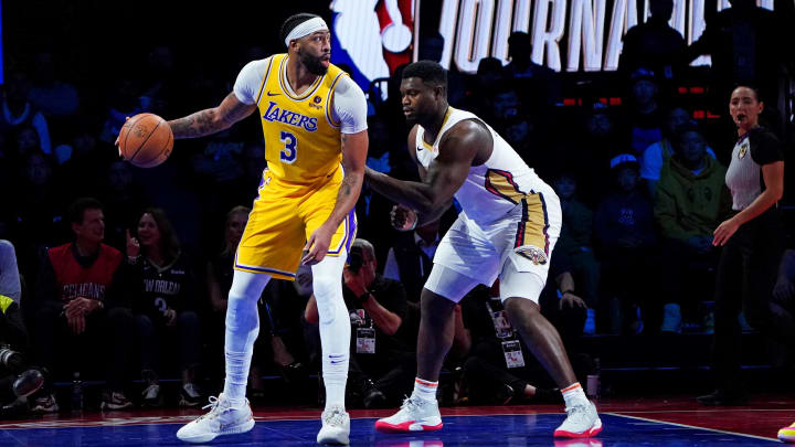 Dec 7, 2023; Las Vegas, Nevada, USA; Los Angeles Lakers forward Anthony Davis (3) handles the ball against New Orleans Pelicans forward Zion Williamson (1) during the second quarter in the NBA In Season Tournament Semifinal at T-Mobile Arena.