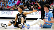 Cincinnati Bearcats guard Dan Skillings Jr. (0) reacts after a foul is called on him in the second half of a NCAA men’s basketball game between the Cincinnati Bearcats and Dayton Flyers, Friday, Dec. 20, 2024, at Heritage Bank Center in downtown Cincinnati. Bearcats won 66-59.