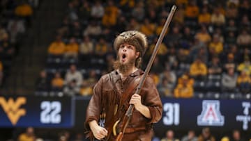 Jan 7, 2025; Morgantown, West Virginia, USA; The West Virginia Mountaineers mascot performs during the first half against the Arizona Wildcats at WVU Coliseum. Mandatory Credit: Ben Queen-Imagn Images